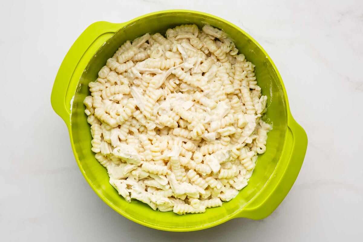 Ingredients for chicken bacon ranch casserole mixed in bowl.