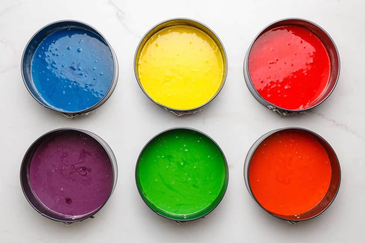 6 colors of cake batter in 6 pans.