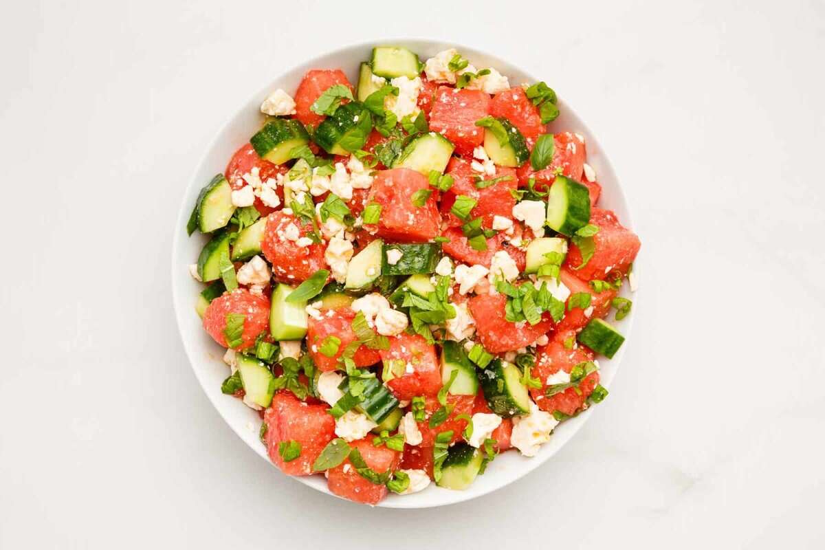 Watermelon, mint, and feta salad in serving bowl.