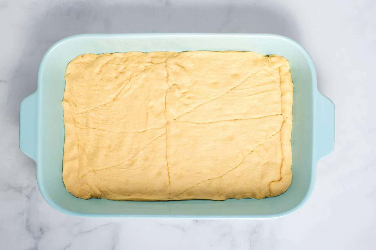 Crescent roll dough in pan.