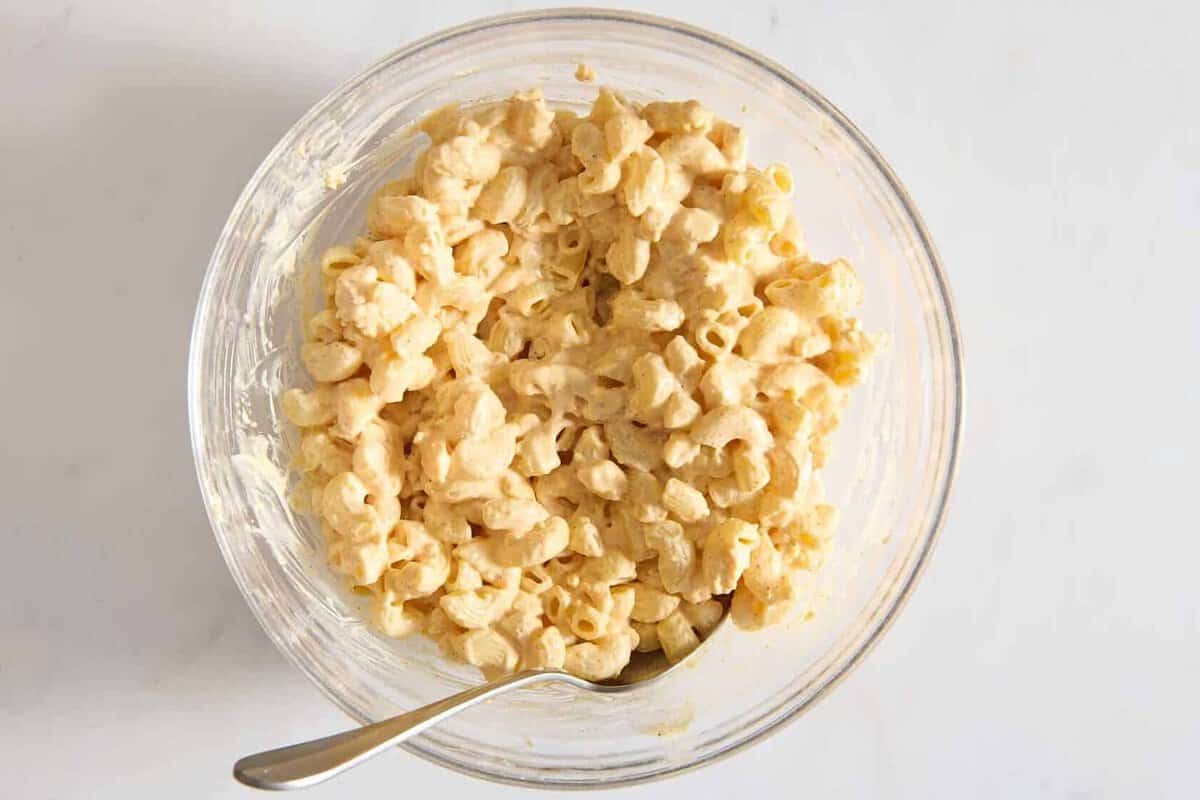 Pasta stirred into dressing.