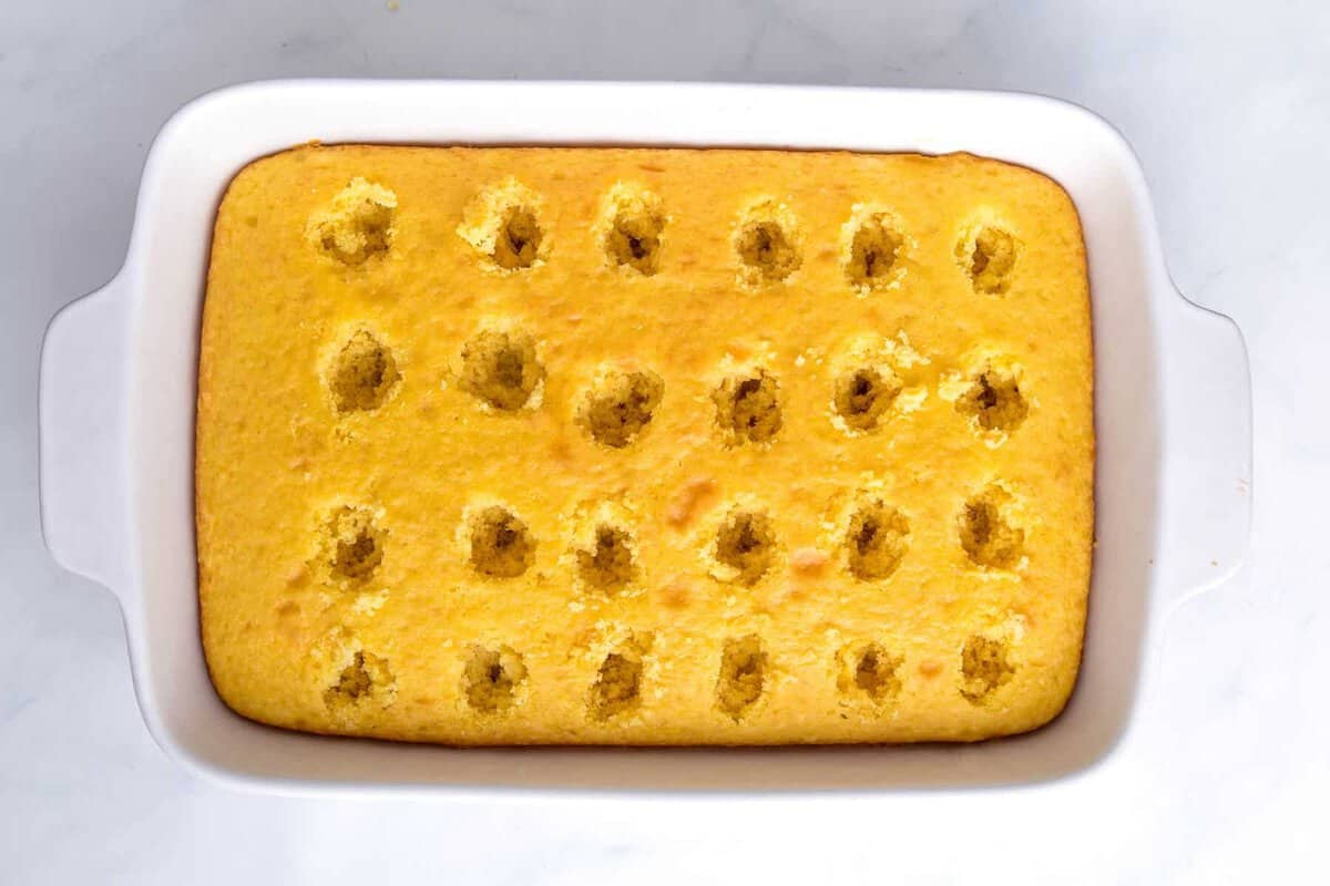 Cake with holes poked in it.