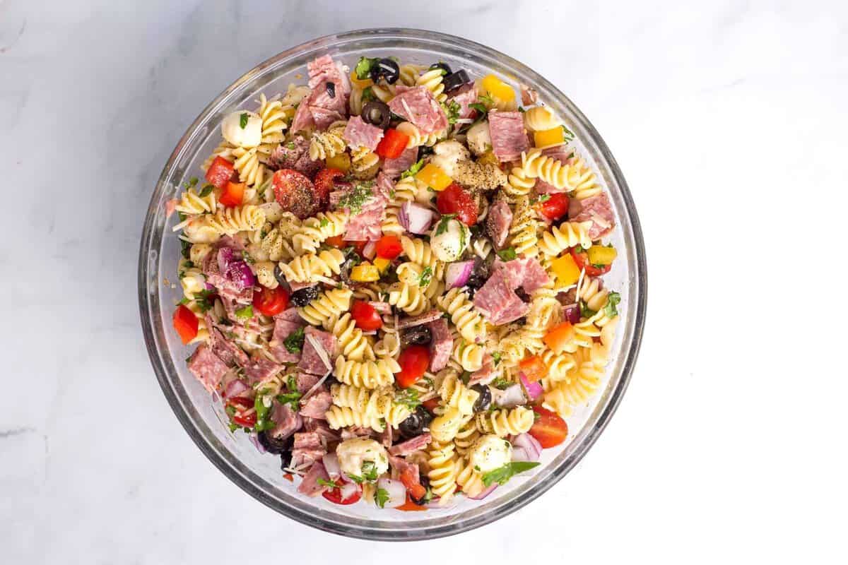 Italian pasta salad in glass bowl.
