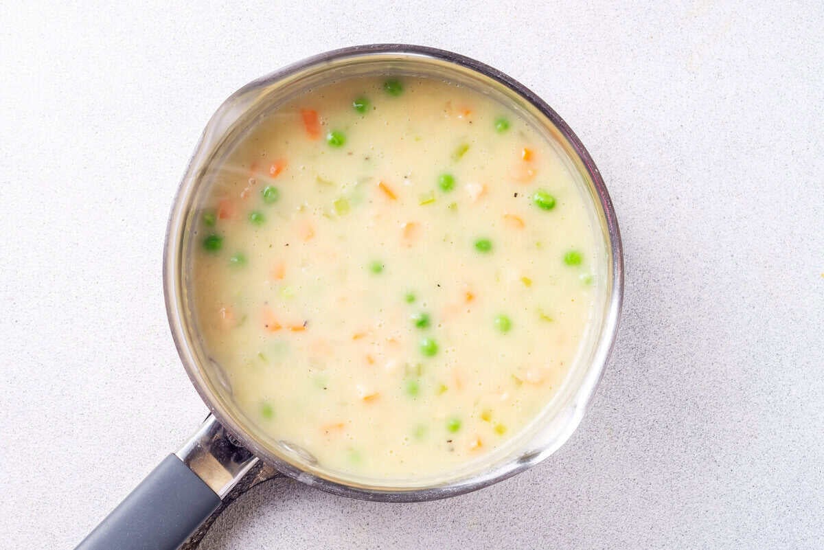 Creamy chicken filling in pot.