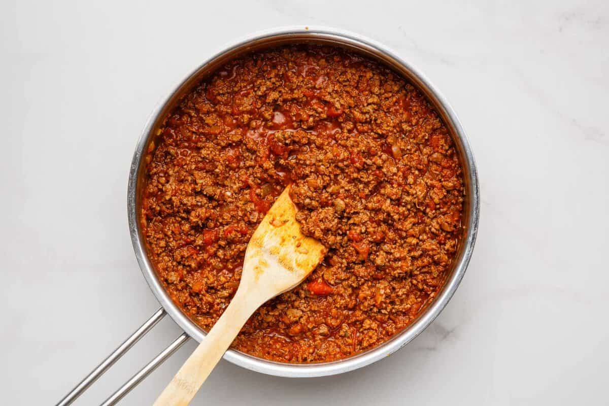 Ground beef filling mixture in skillet.