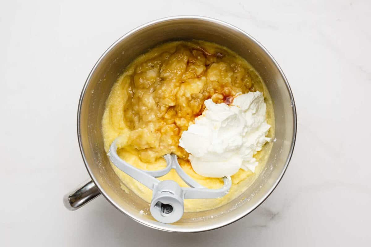 Sour cream and banana added to creamed butter and sugar.