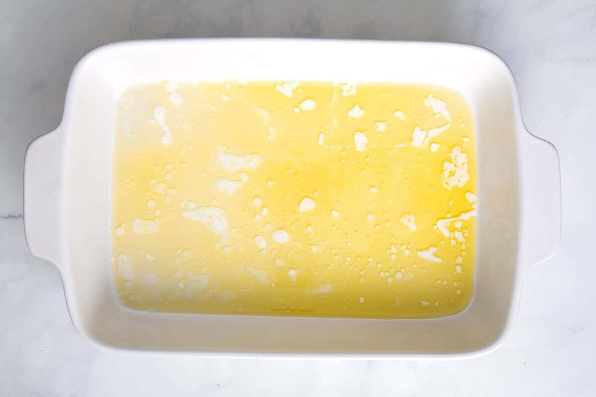Melted butter in baking dish.