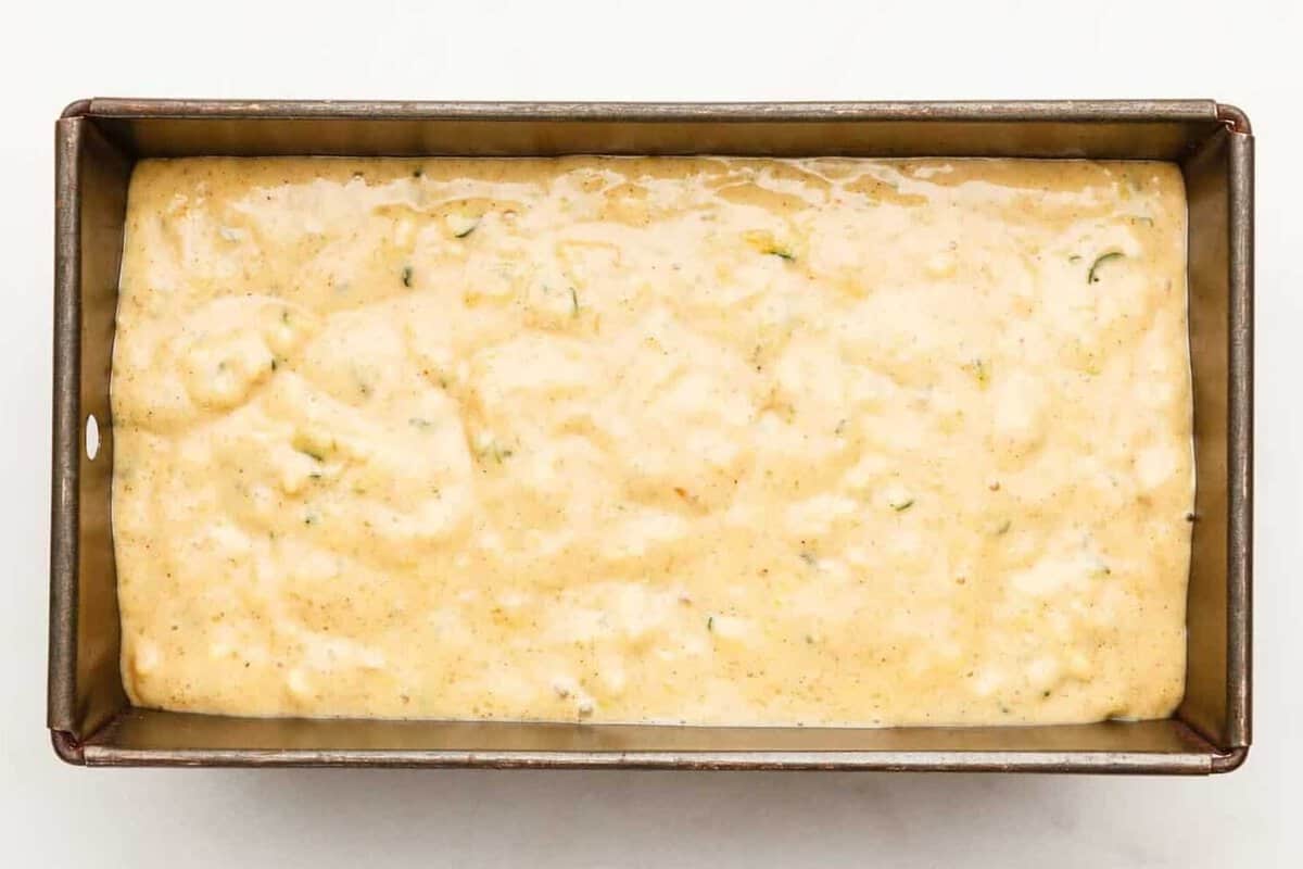 Unbaked banana zucchini bread in pan.