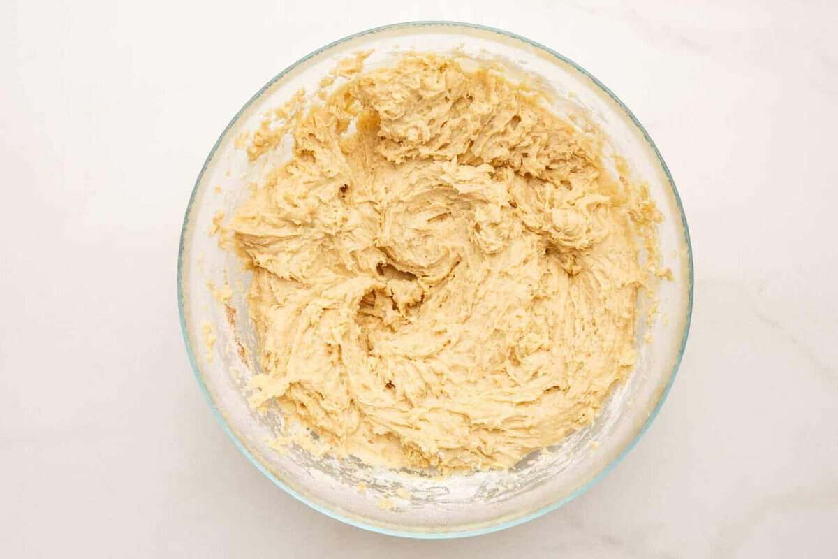 Banana bread batter in bowl.