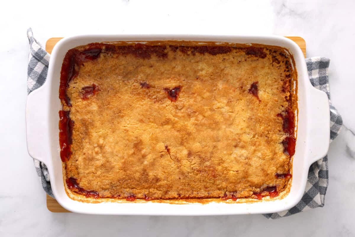 Cherry dump cake in baking dish.